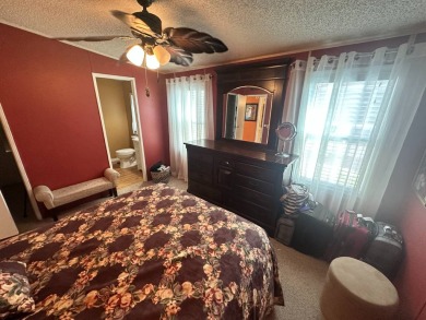 This 2 bedrooms, 2 bathrooms stucco home is being sold furnished on Del Tura Golf and Country Club in Florida - for sale on GolfHomes.com, golf home, golf lot