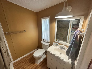 This 2 bedrooms, 2 bathrooms stucco home is being sold furnished on Del Tura Golf and Country Club in Florida - for sale on GolfHomes.com, golf home, golf lot
