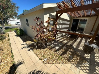 This 2 bedrooms, 2 bathrooms stucco home is being sold furnished on Del Tura Golf and Country Club in Florida - for sale on GolfHomes.com, golf home, golf lot