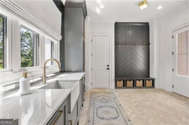 Exquisite One-Year-Old Resale in The Cottages at The Manor - on Manor Golf and Country Club in Georgia - for sale on GolfHomes.com, golf home, golf lot