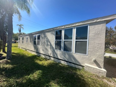 This 2 bedrooms, 2 bathrooms stucco home is being sold furnished on Del Tura Golf and Country Club in Florida - for sale on GolfHomes.com, golf home, golf lot
