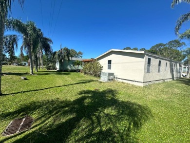 This 2 bedrooms, 2 bathrooms stucco home is being sold furnished on Del Tura Golf and Country Club in Florida - for sale on GolfHomes.com, golf home, golf lot