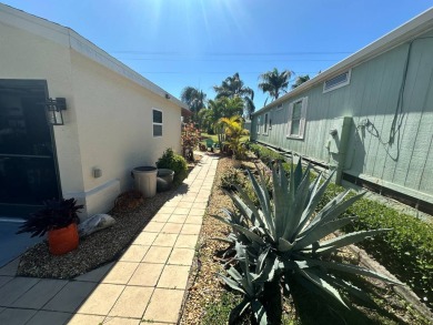 This 2 bedrooms, 2 bathrooms stucco home is being sold furnished on Del Tura Golf and Country Club in Florida - for sale on GolfHomes.com, golf home, golf lot