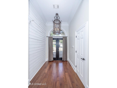 Elegant updated home in the highly sought after Diamondhead on Diamondhead Country Club in Mississippi - for sale on GolfHomes.com, golf home, golf lot