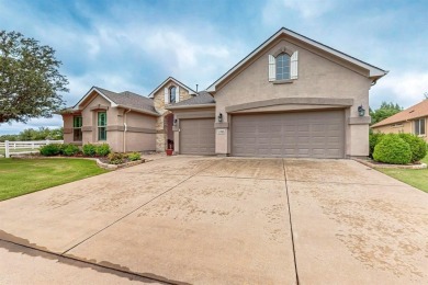 Beautifully positioned on a corner lot, this elegant Rialta home on Wildhorse Golf Club of Robson Ranch in Texas - for sale on GolfHomes.com, golf home, golf lot