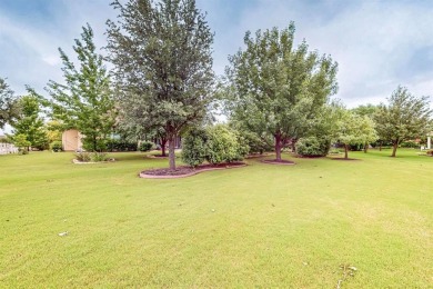 Beautifully positioned on a corner lot, this elegant Rialta home on Wildhorse Golf Club of Robson Ranch in Texas - for sale on GolfHomes.com, golf home, golf lot