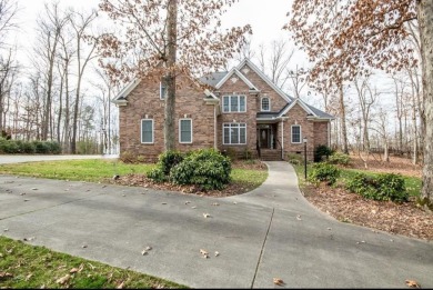This beautiful brick home is nestled along the 14th hole of on Indian Trace Golf Course in Georgia - for sale on GolfHomes.com, golf home, golf lot