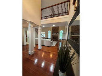 This beautiful brick home is nestled along the 14th hole of on Indian Trace Golf Course in Georgia - for sale on GolfHomes.com, golf home, golf lot