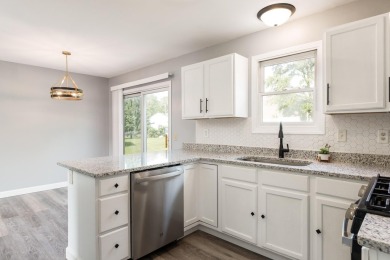 Beautiful 3 bedroom, 1.5 bath, two-story home with a 2 car on Sandy Hollow Golf Course in Illinois - for sale on GolfHomes.com, golf home, golf lot