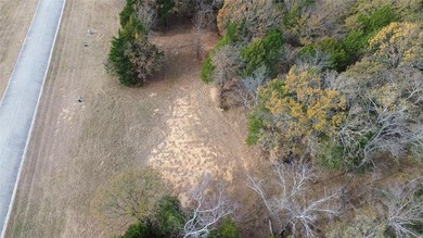 This prime lot on a quiet street in Rock Creek, Gordonville on Rock Creek Golf Club in Texas - for sale on GolfHomes.com, golf home, golf lot