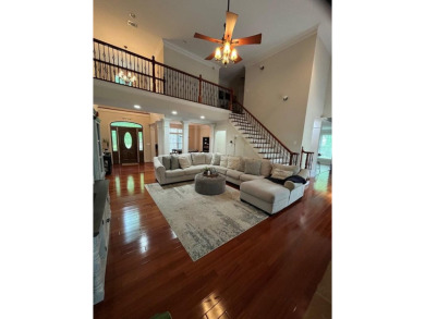 This beautiful brick home is nestled along the 14th hole of on Indian Trace Golf Course in Georgia - for sale on GolfHomes.com, golf home, golf lot