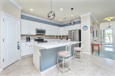 This home offers an ideal blend of modern comfort and elegant on Heron Creek Golf and Country Club in Florida - for sale on GolfHomes.com, golf home, golf lot
