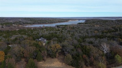 This prime lot on a quiet street in Rock Creek, Gordonville on Rock Creek Golf Club in Texas - for sale on GolfHomes.com, golf home, golf lot