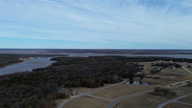 This prime lot on a quiet street in Rock Creek, Gordonville on Rock Creek Golf Club in Texas - for sale on GolfHomes.com, golf home, golf lot