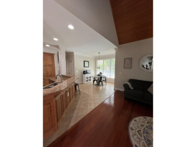 This beautiful brick home is nestled along the 14th hole of on Indian Trace Golf Course in Georgia - for sale on GolfHomes.com, golf home, golf lot