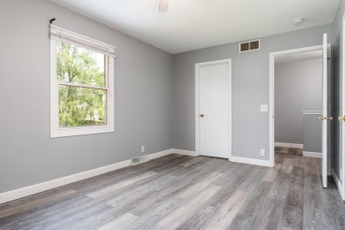 Beautiful 3 bedroom, 1.5 bath, two-story home with a 2 car on Sandy Hollow Golf Course in Illinois - for sale on GolfHomes.com, golf home, golf lot