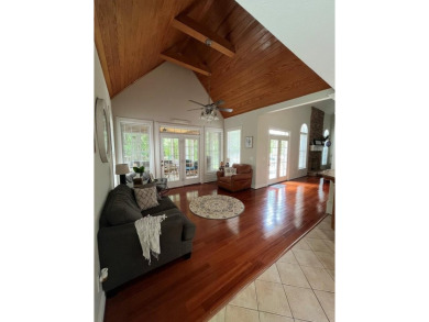 This beautiful brick home is nestled along the 14th hole of on Indian Trace Golf Course in Georgia - for sale on GolfHomes.com, golf home, golf lot