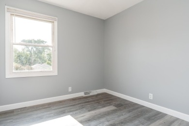 Beautiful 3 bedroom, 1.5 bath, two-story home with a 2 car on Sandy Hollow Golf Course in Illinois - for sale on GolfHomes.com, golf home, golf lot