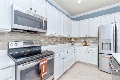 This home offers an ideal blend of modern comfort and elegant on Heron Creek Golf and Country Club in Florida - for sale on GolfHomes.com, golf home, golf lot