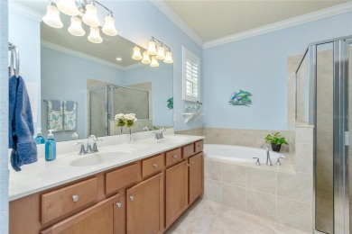 This home offers an ideal blend of modern comfort and elegant on Heron Creek Golf and Country Club in Florida - for sale on GolfHomes.com, golf home, golf lot