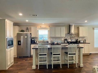 Embrace the comfort as soon as you walk into this beautiful on Royal Wood Golf and Country Club in Florida - for sale on GolfHomes.com, golf home, golf lot