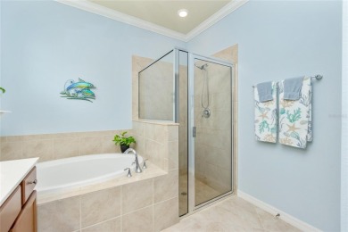 This home offers an ideal blend of modern comfort and elegant on Heron Creek Golf and Country Club in Florida - for sale on GolfHomes.com, golf home, golf lot