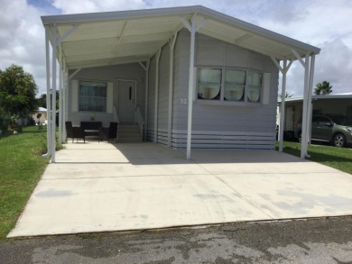 2025 roof on this nicely updated home  and it's just what you on Spanish Lakes I in Florida - for sale on GolfHomes.com, golf home, golf lot