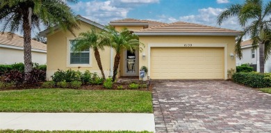 This home offers an ideal blend of modern comfort and elegant on Heron Creek Golf and Country Club in Florida - for sale on GolfHomes.com, golf home, golf lot