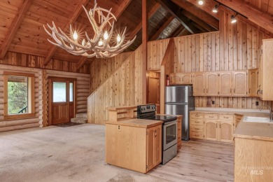 Custom, two-level True log cabin in the desirable Golf Course on Meadowcreek Golf Resort in Idaho - for sale on GolfHomes.com, golf home, golf lot