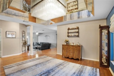 Welcome to this 5BR/4BA custom home on a quiet cul-de-sac with on Jacaranda Golf Club in Florida - for sale on GolfHomes.com, golf home, golf lot