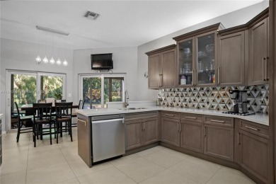 Welcome to this 5BR/4BA custom home on a quiet cul-de-sac with on Jacaranda Golf Club in Florida - for sale on GolfHomes.com, golf home, golf lot