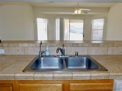 This beautiful 3 bed,2 bath home is located in desirable Ventana on Laughlin Ranch Golf Club in Arizona - for sale on GolfHomes.com, golf home, golf lot