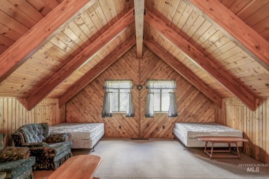 Custom, two-level True log cabin in the desirable Golf Course on Meadowcreek Golf Resort in Idaho - for sale on GolfHomes.com, golf home, golf lot