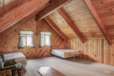 Custom, two-level True log cabin in the desirable Golf Course on Meadowcreek Golf Resort in Idaho - for sale on GolfHomes.com, golf home, golf lot