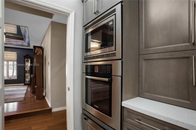 Welcome to this 5BR/4BA custom home on a quiet cul-de-sac with on Jacaranda Golf Club in Florida - for sale on GolfHomes.com, golf home, golf lot