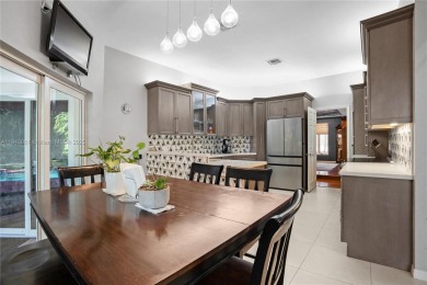 Welcome to this 5BR/4BA custom home on a quiet cul-de-sac with on Jacaranda Golf Club in Florida - for sale on GolfHomes.com, golf home, golf lot