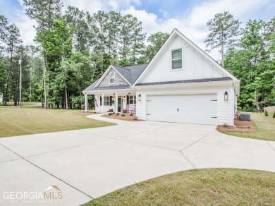 This 2 year old beautiful home has  been gently lived in on Fairfield Plantation Golf and Country Club in Georgia - for sale on GolfHomes.com, golf home, golf lot