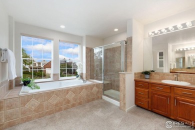 Tucked away on a quiet cul-de-sac in the sought-after Huntington on Southridge Golf Club in Colorado - for sale on GolfHomes.com, golf home, golf lot
