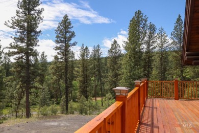 Custom, two-level True log cabin in the desirable Golf Course on Meadowcreek Golf Resort in Idaho - for sale on GolfHomes.com, golf home, golf lot