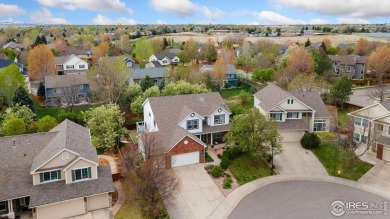 Tucked away on a quiet cul-de-sac in the sought-after Huntington on Southridge Golf Club in Colorado - for sale on GolfHomes.com, golf home, golf lot