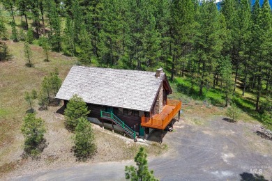 Custom, two-level True log cabin in the desirable Golf Course on Meadowcreek Golf Resort in Idaho - for sale on GolfHomes.com, golf home, golf lot