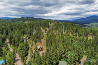 Custom, two-level True log cabin in the desirable Golf Course on Meadowcreek Golf Resort in Idaho - for sale on GolfHomes.com, golf home, golf lot