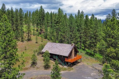 Custom, two-level True log cabin in the desirable Golf Course on Meadowcreek Golf Resort in Idaho - for sale on GolfHomes.com, golf home, golf lot