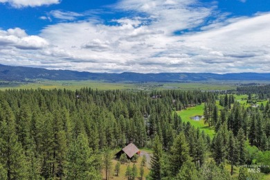 Custom, two-level True log cabin in the desirable Golf Course on Meadowcreek Golf Resort in Idaho - for sale on GolfHomes.com, golf home, golf lot