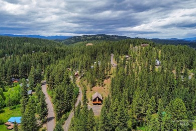 Custom, two-level True log cabin in the desirable Golf Course on Meadowcreek Golf Resort in Idaho - for sale on GolfHomes.com, golf home, golf lot