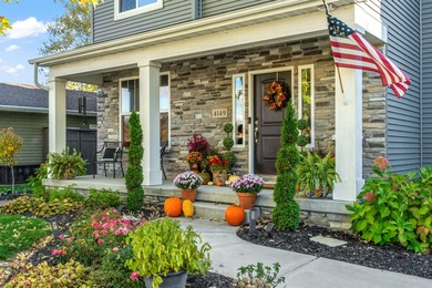 Welcome to this beautiful custom-built 3-bedroom, 2.5-bath home on Lakes of the Four Seasons Country Club in Indiana - for sale on GolfHomes.com, golf home, golf lot