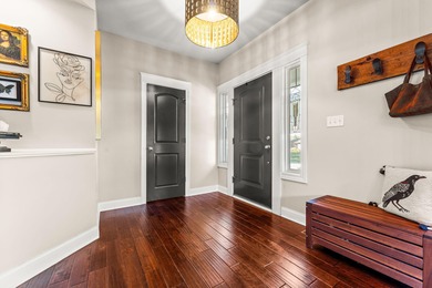 Welcome to this beautiful custom-built 3-bedroom, 2.5-bath home on Lakes of the Four Seasons Country Club in Indiana - for sale on GolfHomes.com, golf home, golf lot