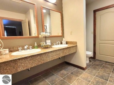 Here is your opportunity to own a suite in The Lodge at Shanty on Cedar River Golf Course in Michigan - for sale on GolfHomes.com, golf home, golf lot