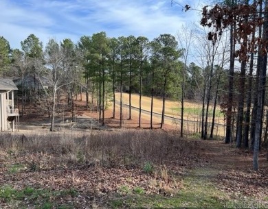 This beautiful building lot on the 7th green of Granada Golf on Granada Golf Course in Arkansas - for sale on GolfHomes.com, golf home, golf lot