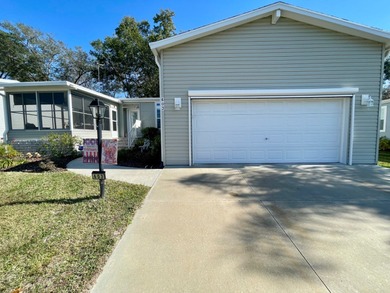 This 3 Bedroom 2 Bath home has been meticulously kept and is on Water Oak Country Club Estates in Florida - for sale on GolfHomes.com, golf home, golf lot